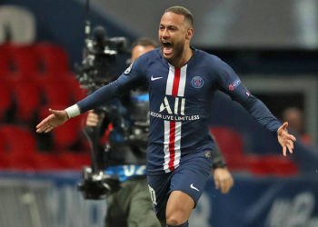 PARIS, FRANCE - MARCH 11: (FREE FOR EDITORIAL USE) In this handout image provided by UEFA, Neymar of Paris Saint-Germain celebrates after scoring his team's first goal during the UEFA Champions League round of 16 second leg match between Paris Saint-Germain and Borussia Dortmund at Parc des Princes on March 11, 2020 in Paris, France. The match is played behind closed doors as a precaution against the spread of COVID-19 (Coronavirus).  (Photo by UEFA - Handout/UEFA via Getty Images)