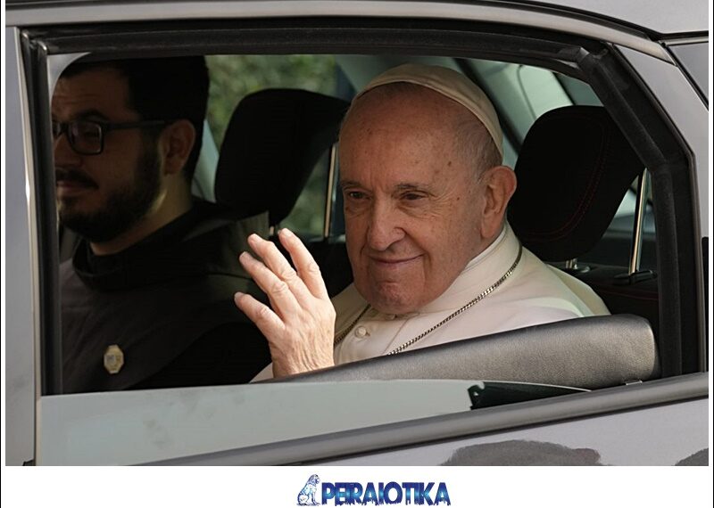 Pope Francis waves as he arrives at the Apostolos Varnavas Orthodox Cathedral in Nicosia, Cyprus, Friday, Dec. 3, 2021. Pope Francis is urging Greek Cypriots and breakaway Turkish Cypriots to resume talks on reunifying the Mediterranean island nation. (AP Photo/Petros Karadjias)