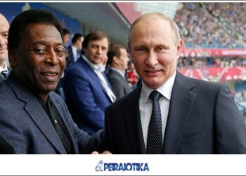 Russian President Vladimir Putin poses with Brazilian soccer legend Pele before the Confederations Cup, Group A soccer match between Russia and New Zealand, at the St. Petersburg Stadium, in St. Petersburg, Russia, Saturday, June 17, 2017. The Confederations Cup has kicked off with host nation Russia opening the World Cup rehearsal tournament against New Zealand. (Dmitry Astakhov/Sputnik, Government Pool Photo via AP)