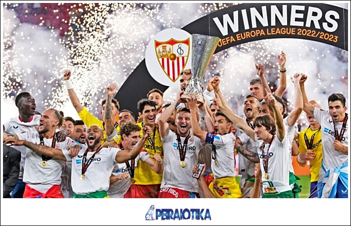 Sevilla's team captain Ivan Rakitic lifts the trophy after winning the Europa League final soccer match between Sevilla and Roma, at the Puskas Arena in Budapest, Hungary, Wednesday, May 31, 2023. Sevilla defeated Roma 4-1 in a penalty shootout after the match ended tied 1-1. (AP Photo/Petr David Josek)