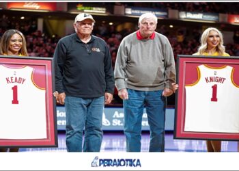 Former Purdue head basketball coach Gene Keady, left, and former Indiana head basketball coach Bobby Knight are honored at halftime of an NBA basketball game between the Indiana Pacers and the New Orleans Pelicans in Indianapolis, Saturday, Feb. 8, 2020. (AP Photo/Michael Conroy)